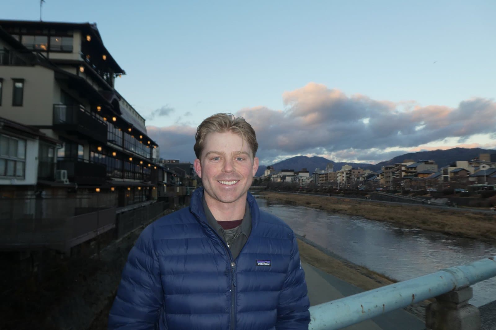 Portrait of Mikey Curtis on a riverside walk in Kyoto, Japan